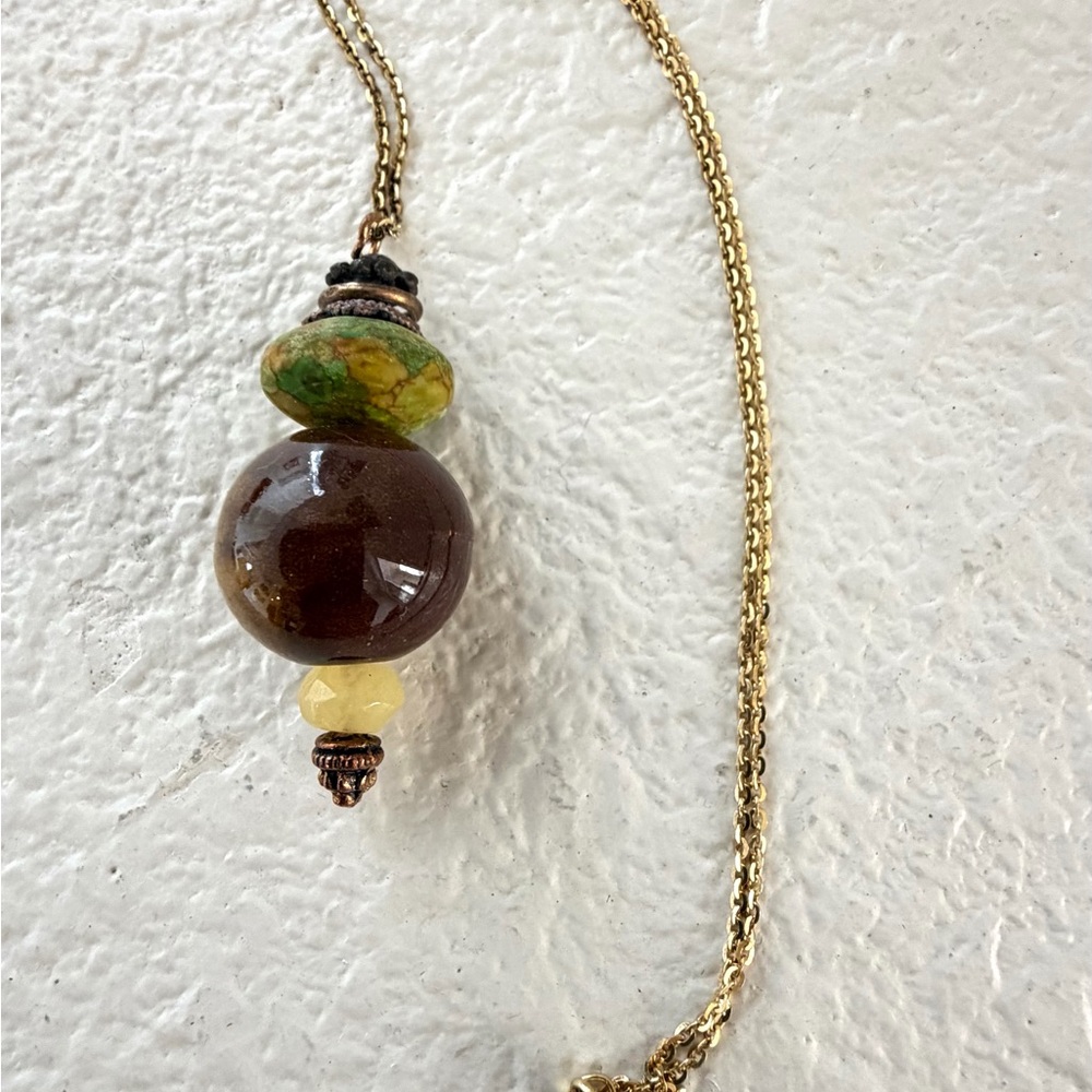 Elegant Gold Tone Choker necklace.